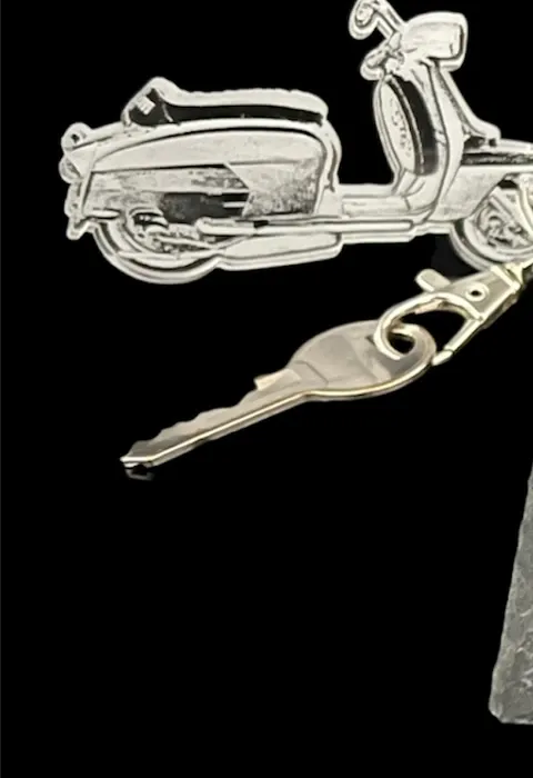 Acrylic keyring with an engraved scooter charm on a split ring