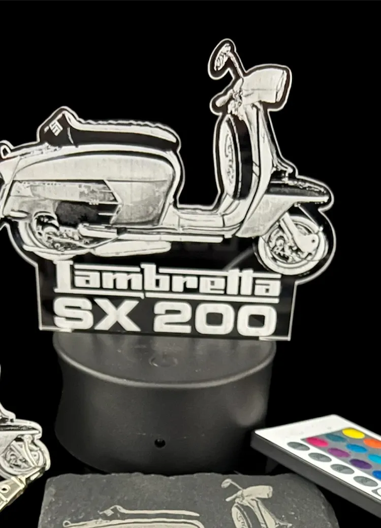 Acrylic bedside lamp with an engraved scooter panel on a colour-change LED base with remote